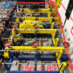 Full roller view of north glass loading table